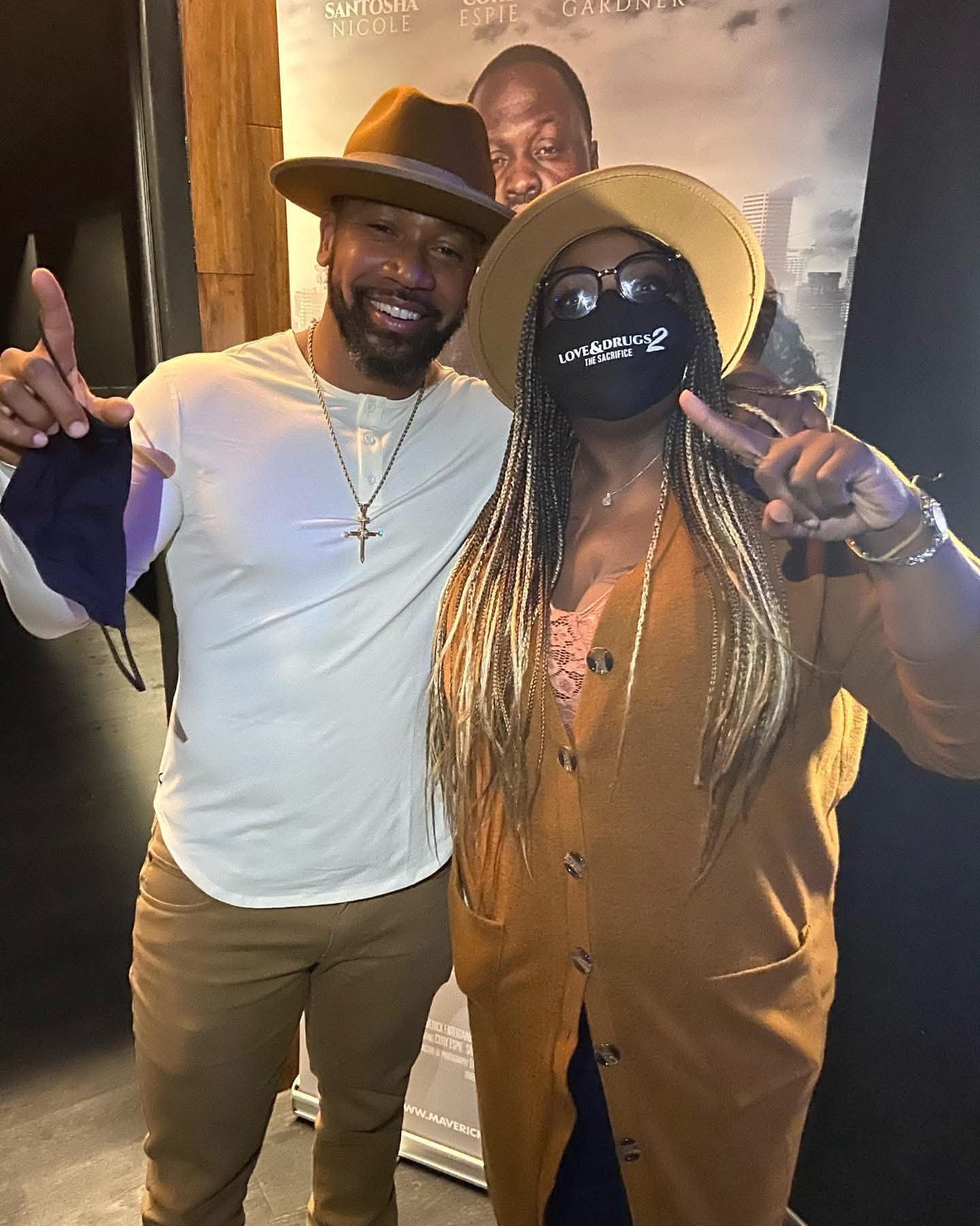 Two guests pose together at the Love & Drugs 2 screening